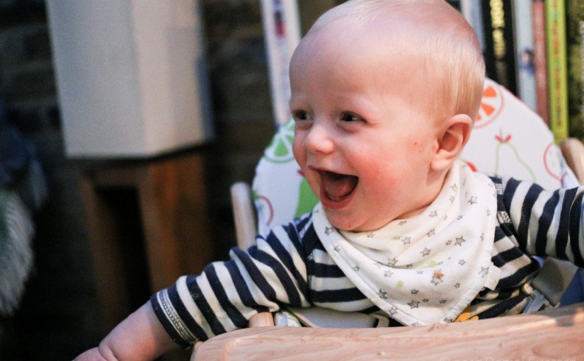 Child laughing at dinner time